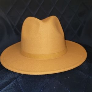 New, flat brim feaux suede beige hat.